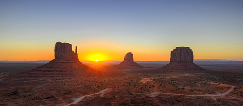 Sunrise behind mesas, West Mitten Butte, East Mitten Butte, Merrick Butte, Scenic Drive, Monument Valley, Navajo Tribal Park, Navajo Nation Reservation, Arizona, Utah, United States of America, USA