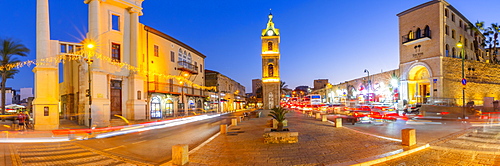 View of The Clock Tower and trail lights at dusk, Jaffa Old Town, Tel Aviv, Israel, Middle East