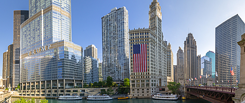 View of The Wrigley Building, Chicago River and watertaxi from DuSable Bridge, Chicago, Illinois, United States of America, North America