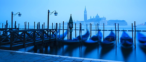 Gondolas on the waterfront of St. Mark's Basin at dawn, Venice, UNESCO World Heritage Site, Veneto Province, Italy, Europe