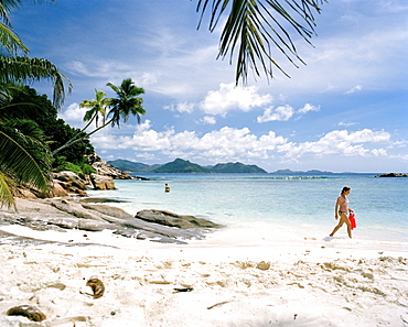 People at Anse Severe Beach, north western La Digue, La Digue and Inner Islands, Republic of Seychelles, Indian Ocean