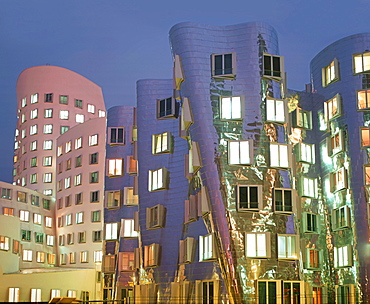 Duesseldorf, futuristic building by architect Frank O Gehry Neuer Zollhof Medienhafen