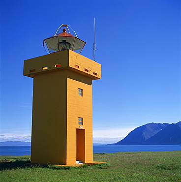 Lighthouse on the coast of the island of Flatey, north Iceland, Polar Regions