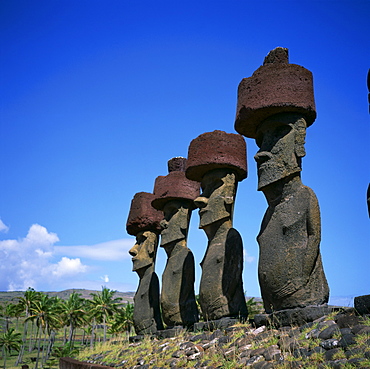 A line of moai statues, Ahu Nau Nau at Anakenu on Easter Island (Rapa Nui), UNESCO World Heritage Site, Chile, South America