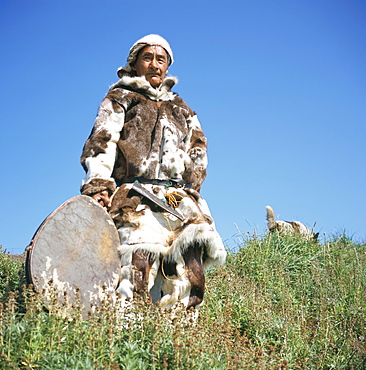 Eskimo in traditional clothing at Yanrakino village (population 150), Chukchi Peninsula, Russian Far East, Russia, Asia