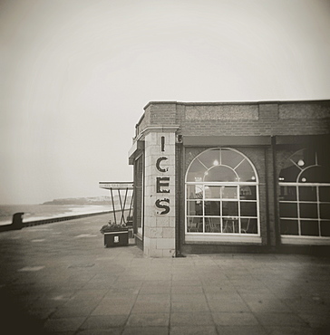 Image taken with a Holga medium format 120 film toy camera of ices sign on side of old Rendezvous Cafe on dull winter's day, Whitley Bay, Tyne & Wear, England, United Kingdom, Europe