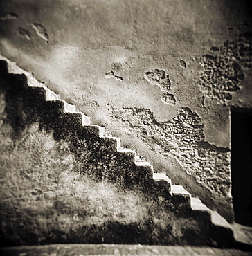 Image taken with a Holga medium format 120 film toy camera of a staircase on the outside of an old stone wall, Chefchaouen, Morocco, North Africa, Africa