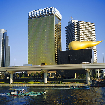 Asahi Beer headquarters, Tokyo, JapanThe building and the sculpture 'Flamme d'Or' were designed by Phillipe Starck in the  1980's