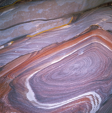 Close-up of coloured sandstone from which the Nabateans carved their city, Petra, Jordan, Middle East