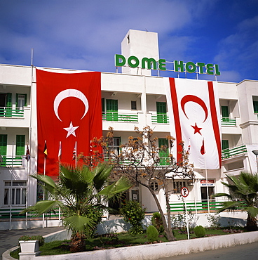 Dome Hotel with Turkish and Turkish Republic of Northern Cyprus flags, Kyrenia, Cyprus, Europe