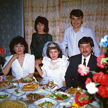 Uzbek bride and groom at wedding reception, Samarkand, Uzbekistan, Central Asia, Asia