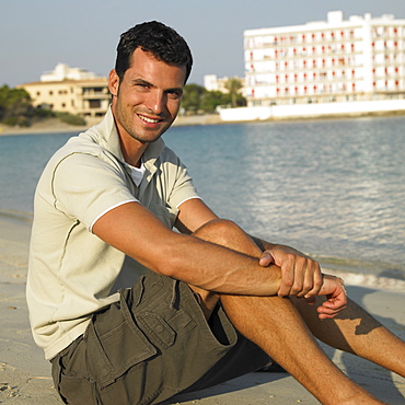 Man sitting on beach