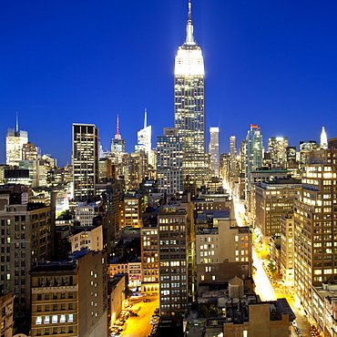 Midtown Manhattan, elevated dusk view towards the Empire State Building, Manhattan, New York City, New York, United States of America, North America