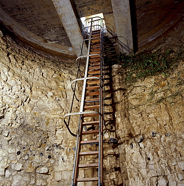 View of ladder down mine shaft, Neolithic flint mine, Grimes Graves, Norfolk, England, United Kingdom, Europe