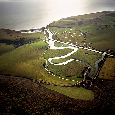 Aerial image of the Cuckmere River at Cuckmere Haven, Seven Sisters Country Park, East Sussex, England, United Kingdom, Europe