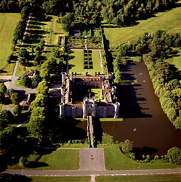 Aerial image of Herstmonceux Castle, a brick-built Tudor castle near Herstmonceux, East Sussex, England, United Kingdom, Europe