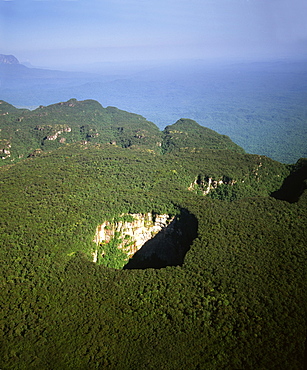 Aerial image of tepuis and Sarisarinama Sinkhole, Jaua-Sarisarinama National Park, Bolivar State, Venezuela, South America