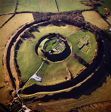 Aerial image of Old Sarum, the original site of Salisbury with castle ruins and cathedral foundations inside two high Iron Age banks (earthworks), Wiltshire, England, United Kingdom, Europe