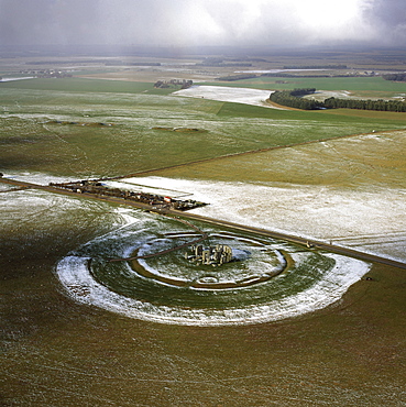 Aerial image of Stonehenge, prehistoric monument and stone circle in snow, UNESCO World Heritage Site, Salisbury Plain, Wiltshire, England, United Kingdom, Europe