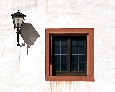 Window and lantern on the facade of a house, Wuerzburg, Bavaria, Germany, Europe