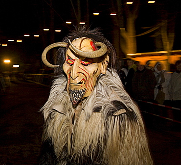 Krampus, a traditional Austrian figure bound to the tradition of St. Nicholas, he is the evil counterpart responsible for punishing and frightening the wicked children while St. Nicholas rewards the honest children, Reichenau at Mt. Rax, Lower Austria, Au