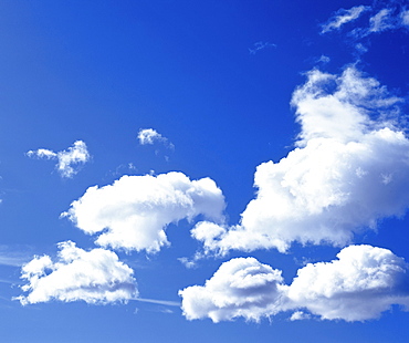 Cumulus clouds in a blue sky