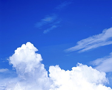 Cumulus clouds in a blue sky