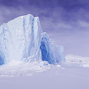 Iceberg in a frozen fjord, coast of Baffin Island, Davis Straight, Nunavut, Canada, North America