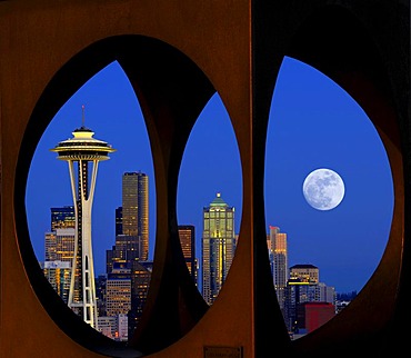 Looking through the steel sculpture "Changing Form" by Doris Chase, Kerry Park, skyline of the Seattle financial district with Space Needle, full moon, Columbia Center, formerly Bank of America Tower, Municipal Tower, formerly Key Tower, U.S. Bank Center,