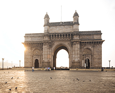 Sunrise behind The Gateway to India, Mumbai (Bombay), India, South Asia