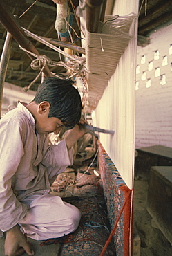 Child working in carpet factory in the 1970s, Lahore, Pakistan, Asia