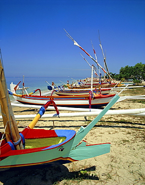 Prahu, colourful local boats, on Sanur beach, Bali, Indonesia