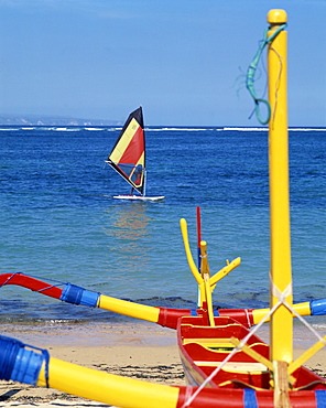 Prahu boat and windsurfer, Sanur Beach, Bali, Indonesia, Southeast Asia, Asia