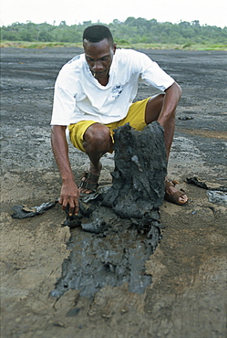 The world's largest natural pitch lake, 90 meters deep, Trinidad, West Indies, Caribbean, Central America