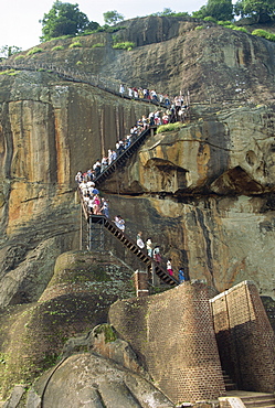 Tourists climbing the rock, Sigiriya, Sri Lanka, Asia