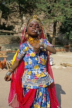 Portrait of a child dancer in the fort, Jodhpur, Rajasthan state, India, Asia