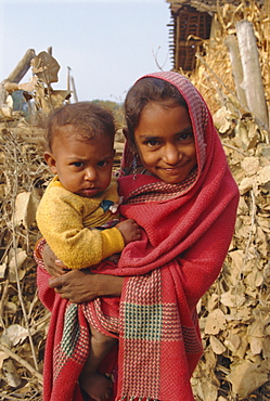 Young girl and baby, Dhariyawad, Rajasthan, India