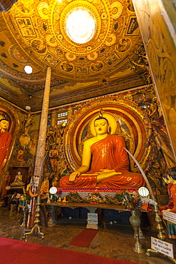 Large Buddhist statue at Gangaramaya Temple, Colombo, Sri Lanka, Asia 