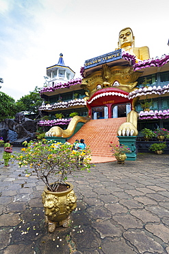 Entrance to Dambulla Museum with caves beyond, Dambulla, Sri Lanka, Asia 