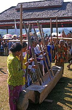 Kasepuhan women symbolically pounding rice at the annual rice festival Seren Tahun, West Java, Indonesia