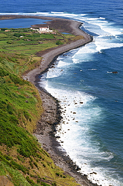 Low aerial of the coastline at Faja dos Tijulos on the north coast of the island of Sao Jorge in the Azores, Portugal, Atlantic Ocean, Europe