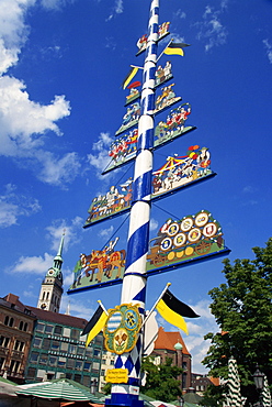 The maypole on the Viktualienmarkt in the city of Munich, Bavaria, Germany, Europe