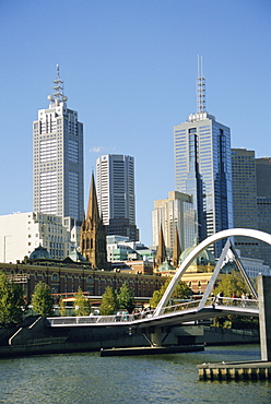 Footbridge over the River Yarra and city skyline, Melbourne, Victoria, Australia