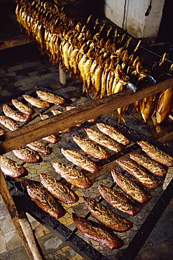 Smoked herring, also known as little bornholmers, in smoking house, Bornholm Island, Denmark, Scandinavia, Europe