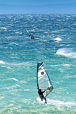 Big Jump windsurfing in high Levante winds in the Strait of Gibraltar, Valdevaqueros, Tarifa, Andalucia, Spain, Europe