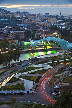 View towards Rike Park and Peace Bridge (Bridge of Peace) over Mtkvari (Kura) River and the city, Tbilisi, Georgia, Caucasus, Central Asia, Asia 