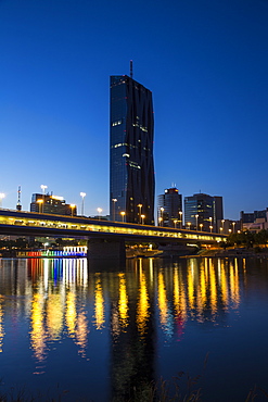 Donau City and DC building reflecting in New Danube River, Vienna, Austria, Europe