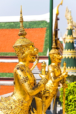 Two gold guardian statues, at the Grand Palace, Bangkok, Thailand, Southeast Asia, Asia