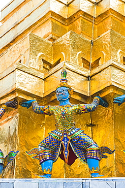 Guardian statues supporting a golden chedi, Grand Palace, Bangkok, Thailand, Southeast Asia, Asia