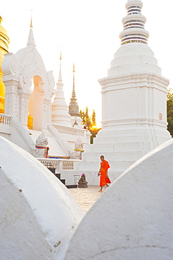 Buddhist monk walking around Wat Suan Dok Temple in Chiang Mai, Thailand, Southeast Asia, Asia